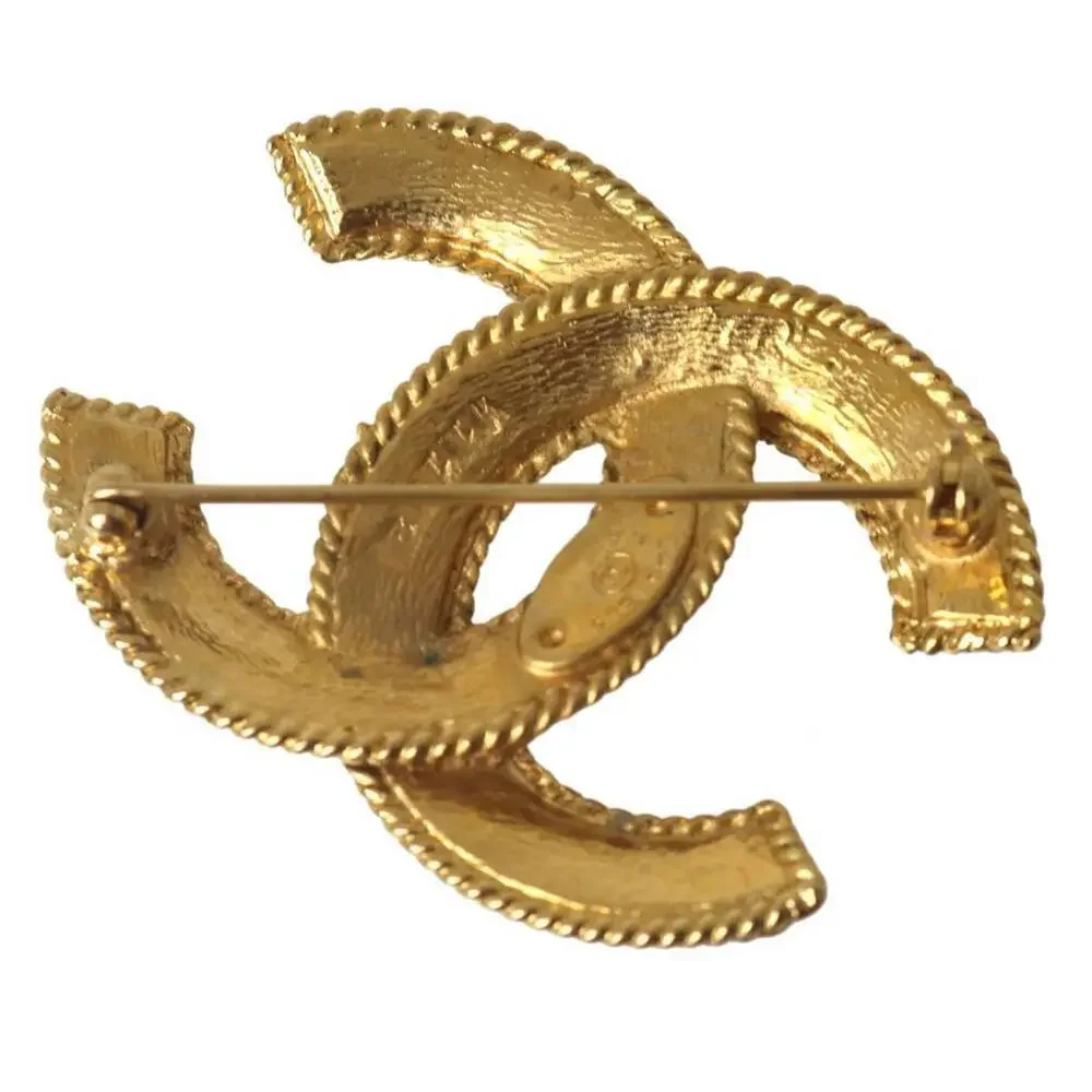 CHANEL Gold Logo Brooch